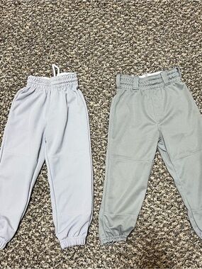 2 Pair Youth XS Baseball Pants - Gray; one pair are Rawlings brand.